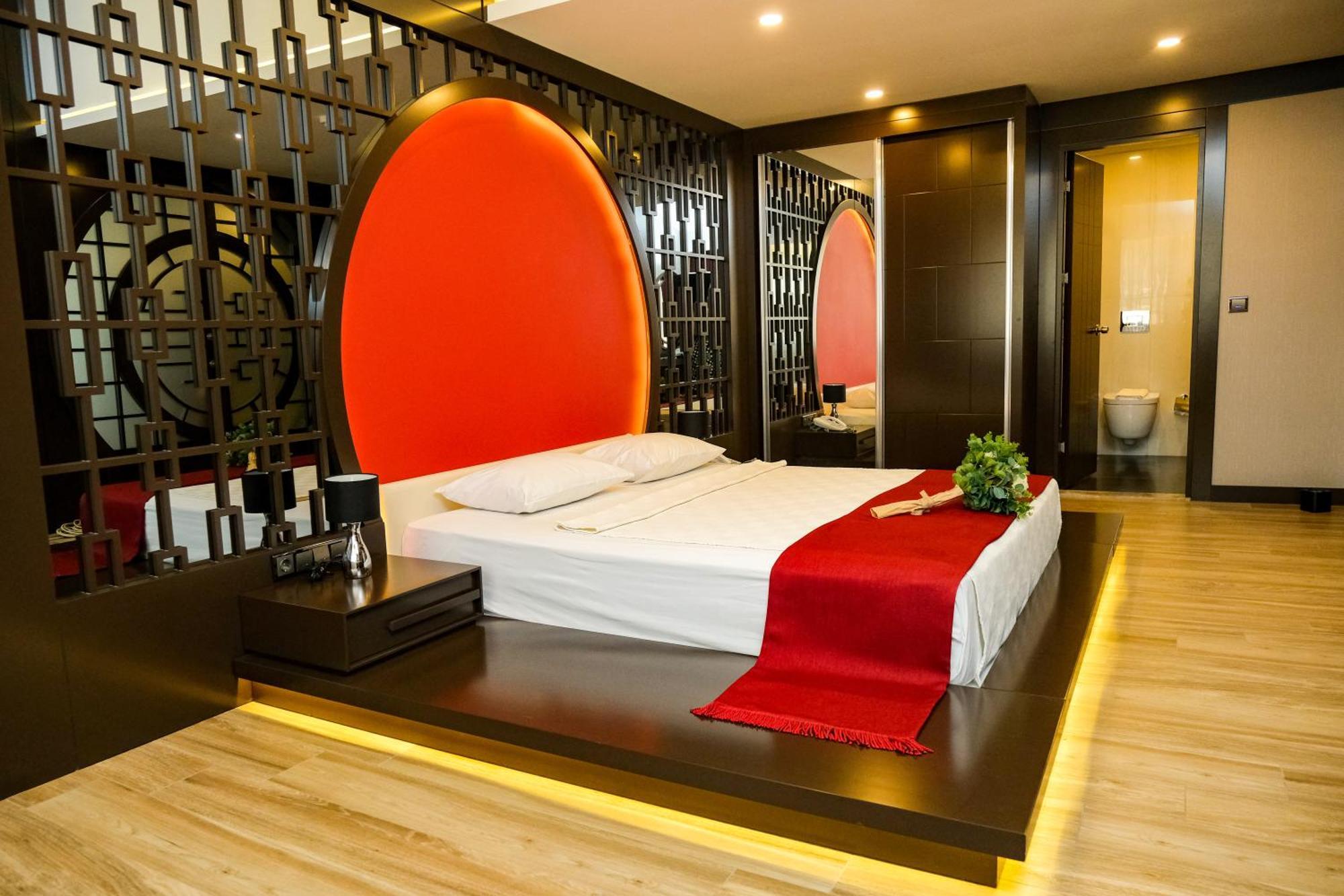 Suite met Kingsize Bed en Uitzicht op Zee